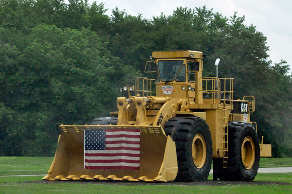 work tractor with American flag